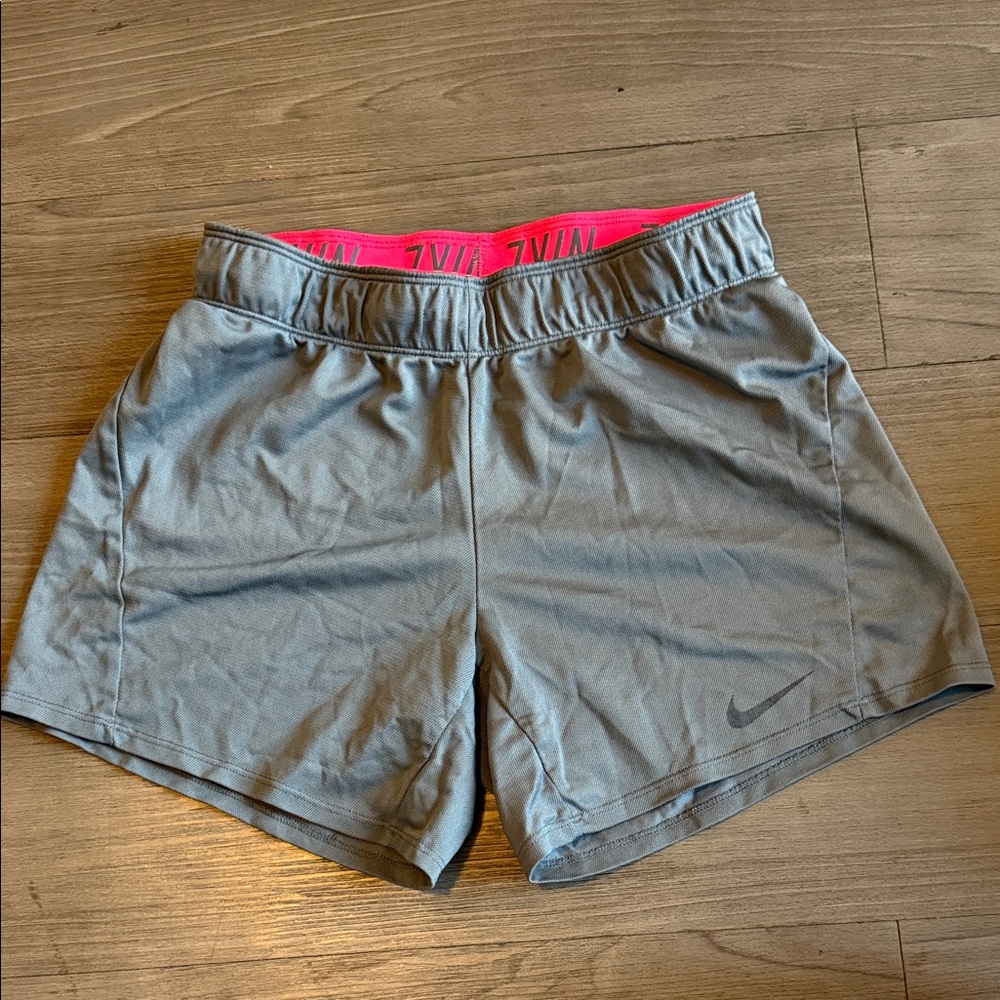 Nike Women's Gray Athletic Shorts with Pink Accents